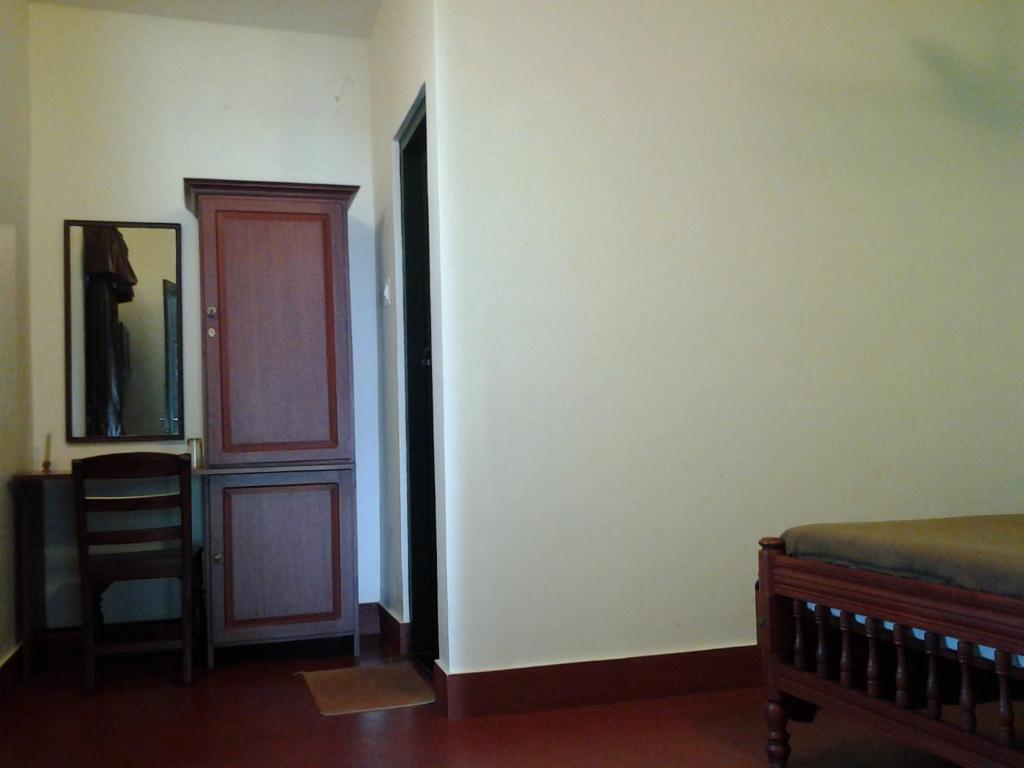 Bed and Breakfast Elphinstone Residencia Kochi Habitación foto